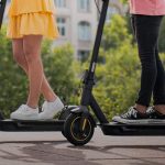 couple on electric scooters