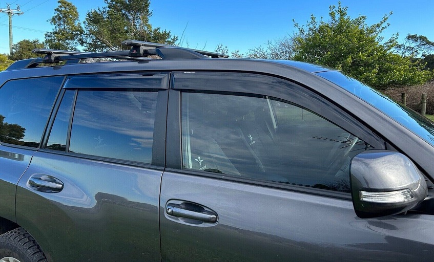 Weathershields on silver Toyota Prado