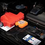 Ultimate9 car battery monitor attached on battery