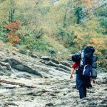 Man walking in wilderness