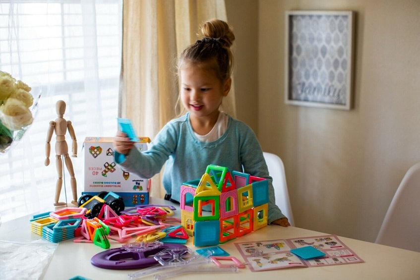 3 year old playing with STEM toys