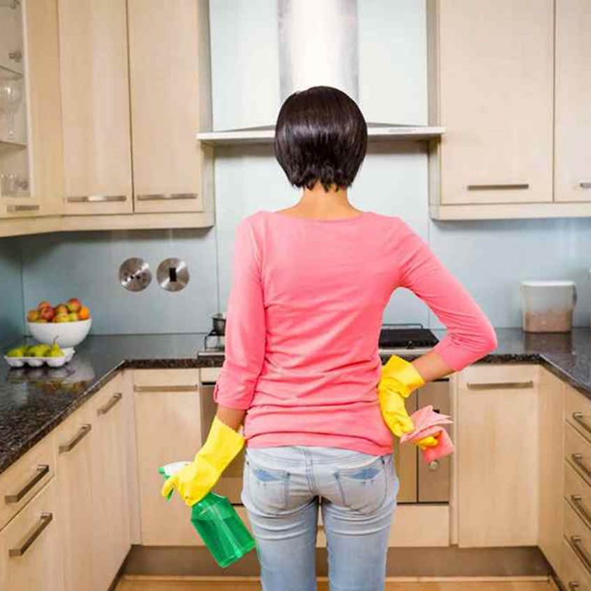 woman cleaning her kithcen