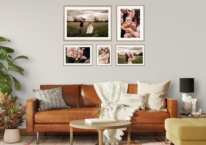 photos on the wall in a living room