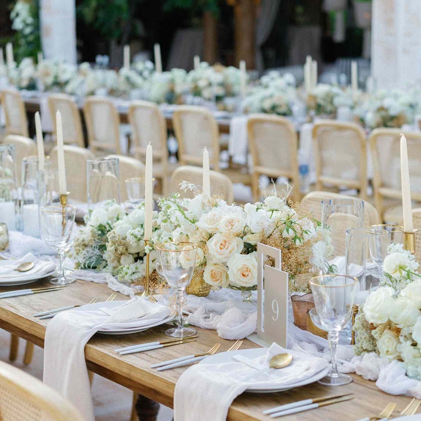 elegant wedding vases filled with fresh white flowers