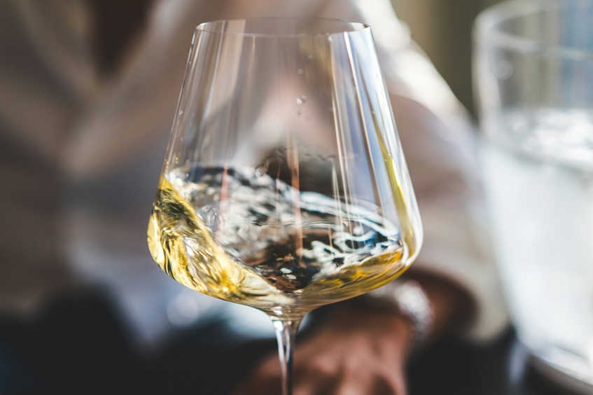 close up shot of glass with sparkling wine